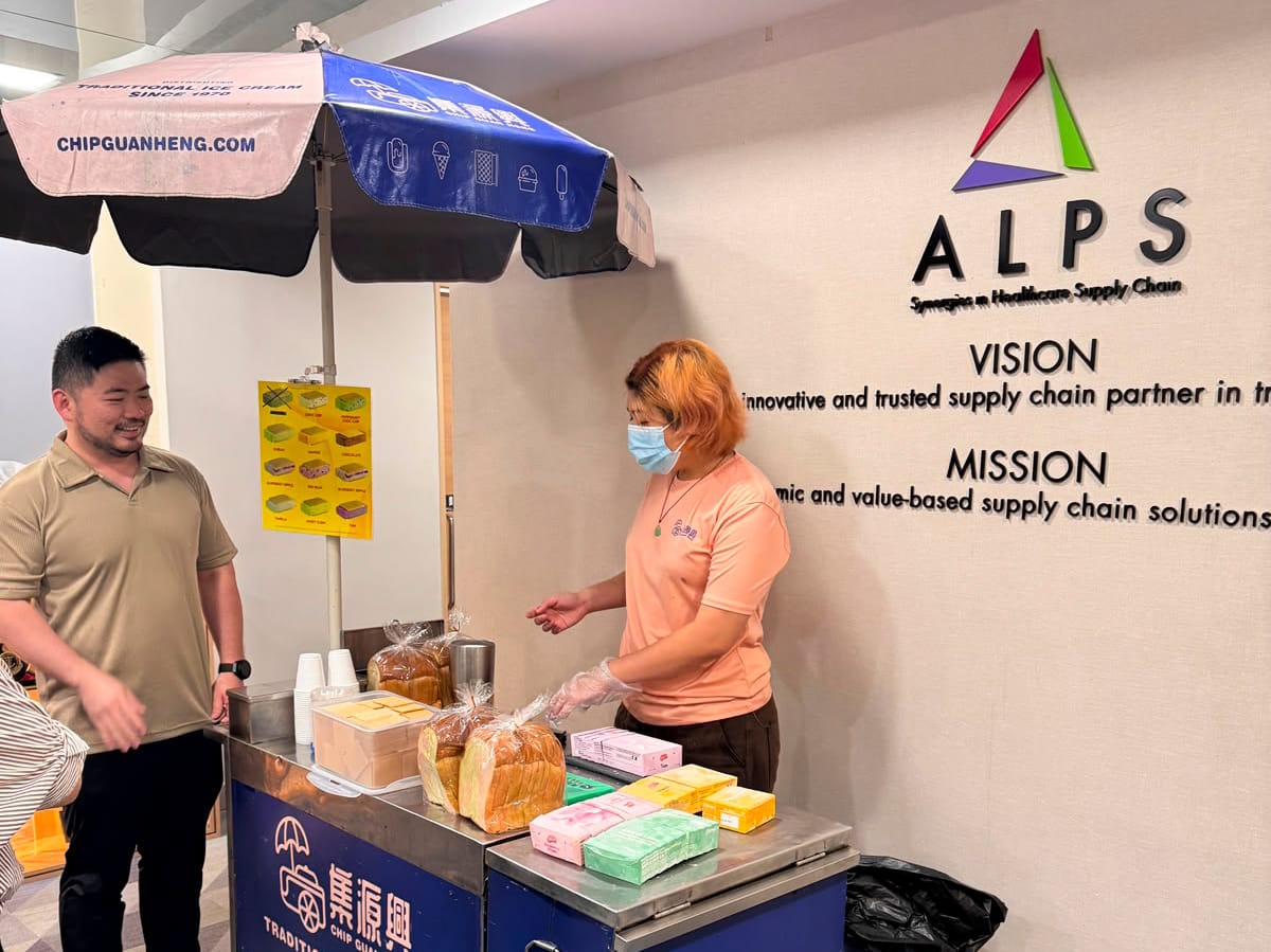 Image of ALPS staff members and their National Day ice-cream treat